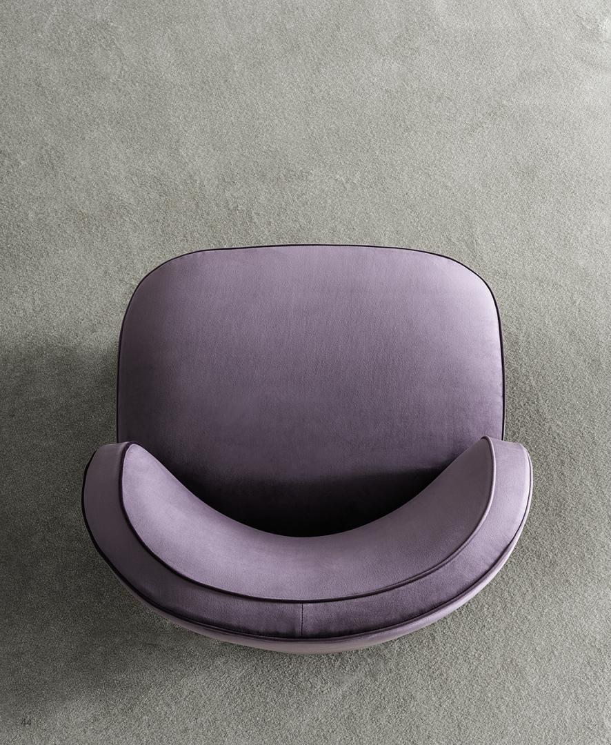 Top-down view of the Casamilano Dhora armchair in purple velvet. Modern accent chair for luxury interior decor and lounge seating