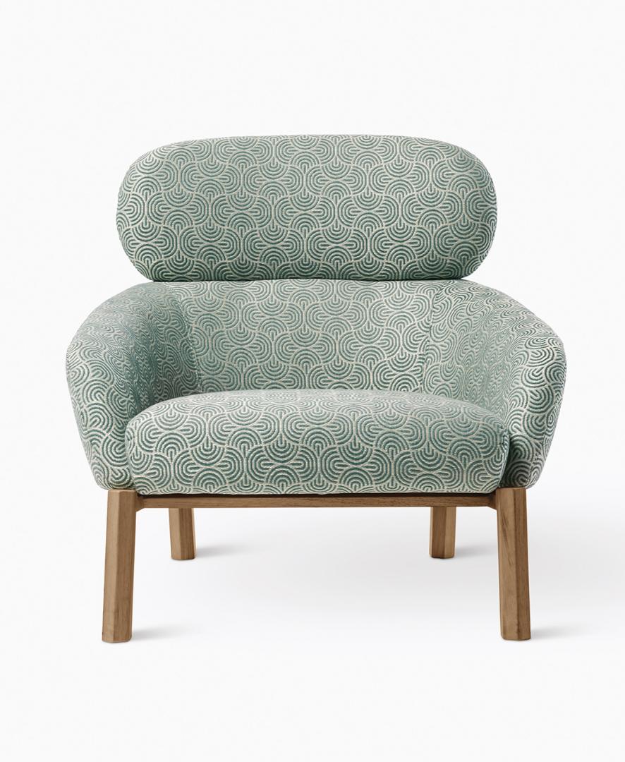 Front view of the patterned Casamilano Elton armchair against a white backdrop, showcasing its modern design and comfortable upholstery