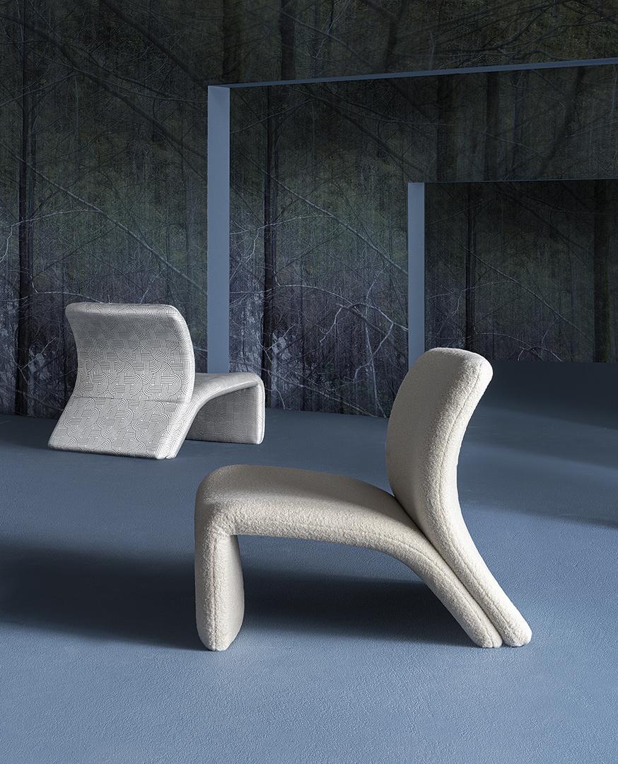 Interior with two Casamilano chairs featuring minimalist design, stylish seating, and a forest backdrop, perfect for modern living rooms