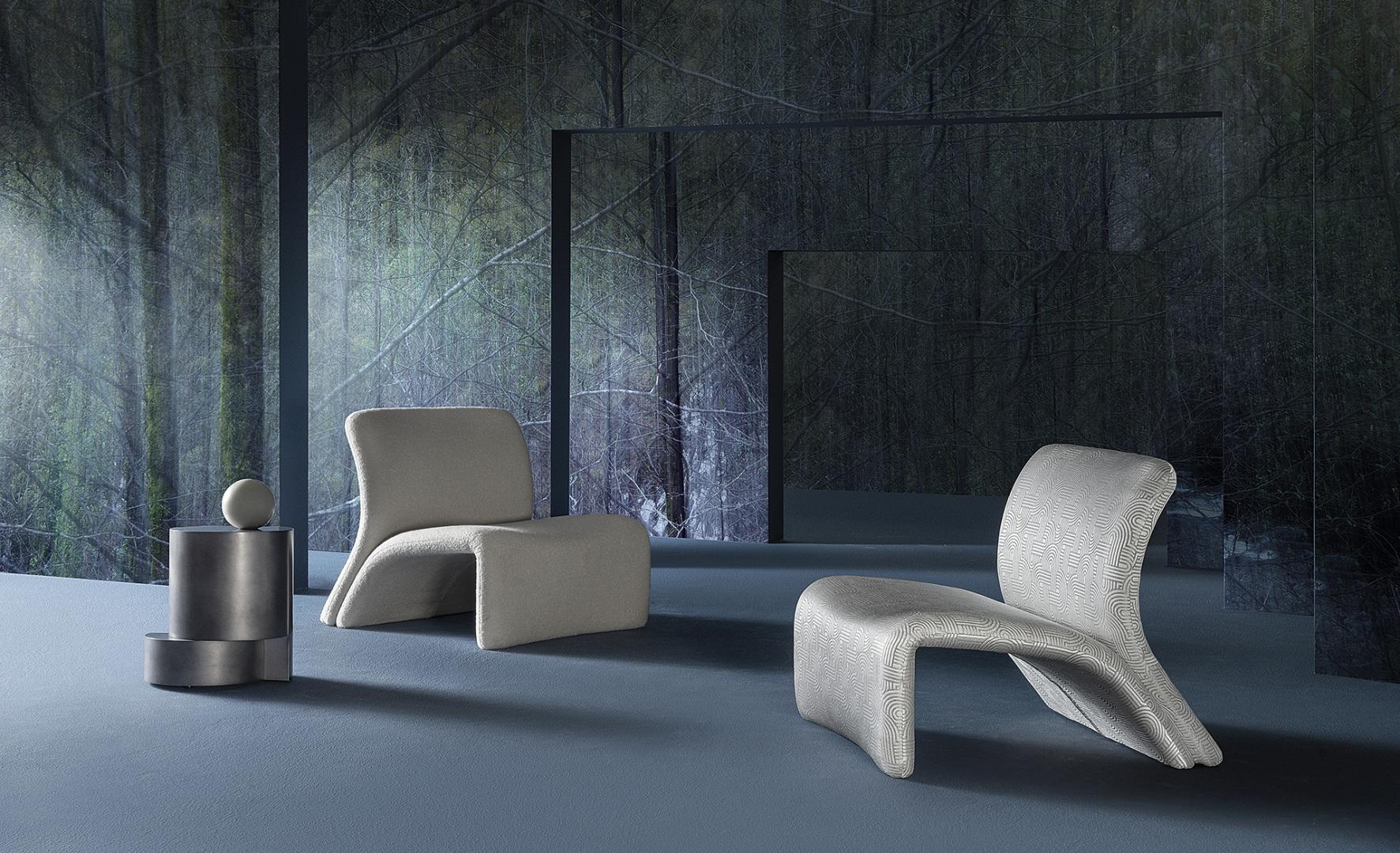 Interior with Casamilano modern chairs and minimalist side table against a forest backdrop.