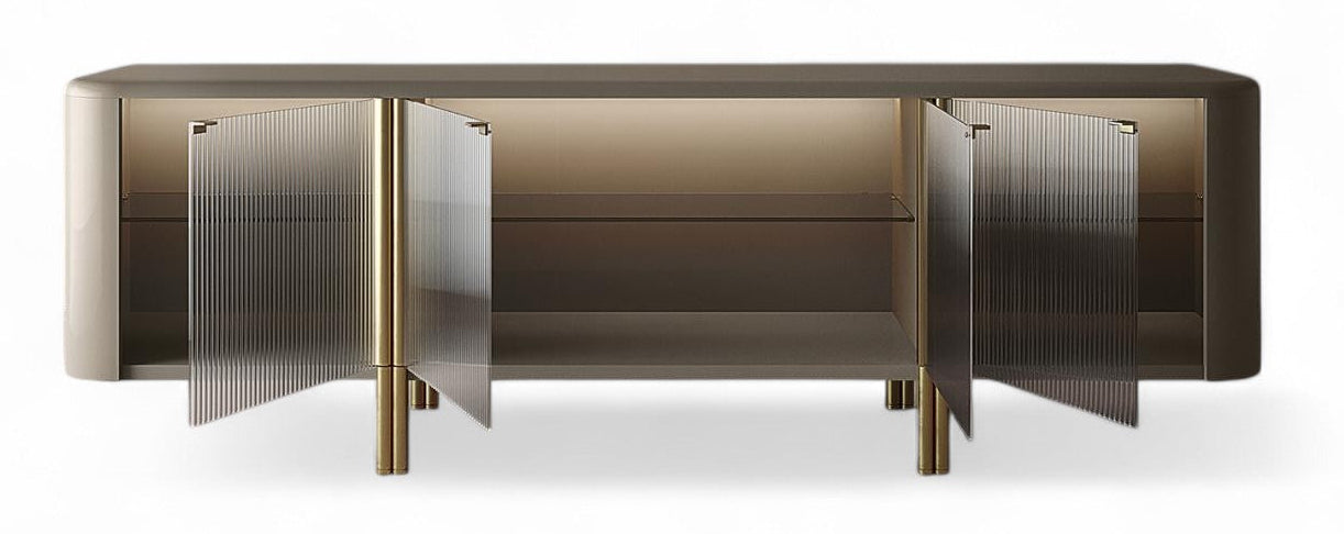 View of modern sideboard with fluted glass doors and brass accents. Sideboard, cabinet, storage, modern furniture, fluted glass, brass hardware, interior design, luxury furniture, living room storage, dining room furniture. Modern sideboard with open fluted glass doors and brass legs on white background.