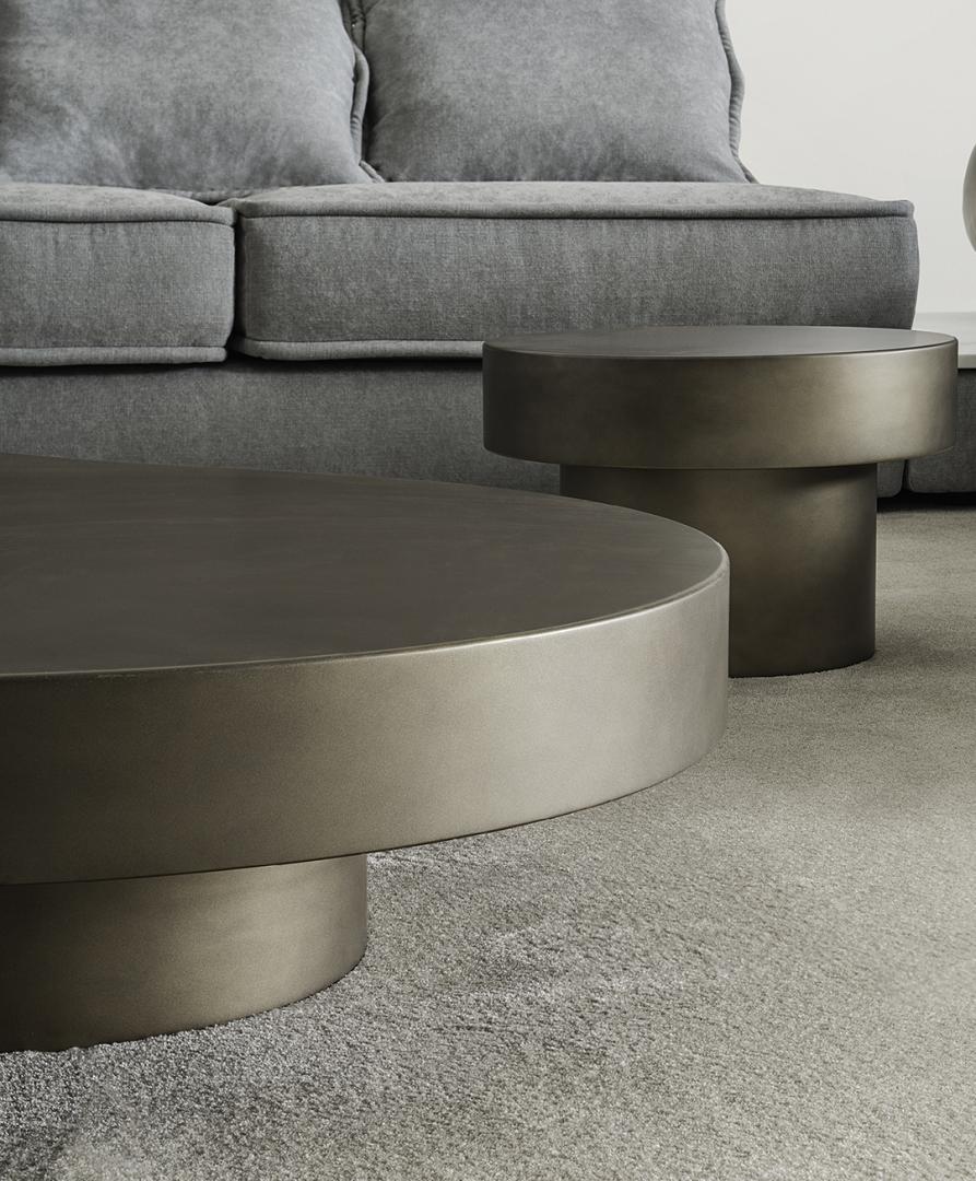 Modern living room featuring Casamilano Nuvola metal coffee tables and a gray sofa. Perfect for contemporary living room decor