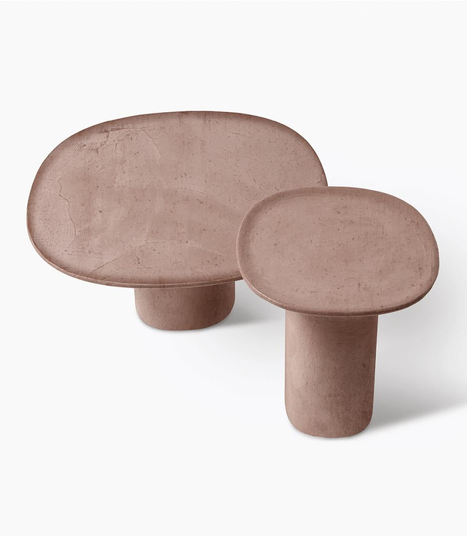 Close-up of Casamilano's Callas IN & OUTDOOR tables. Modern pink pedestal tables for versatile use as side, coffee, or accent tables