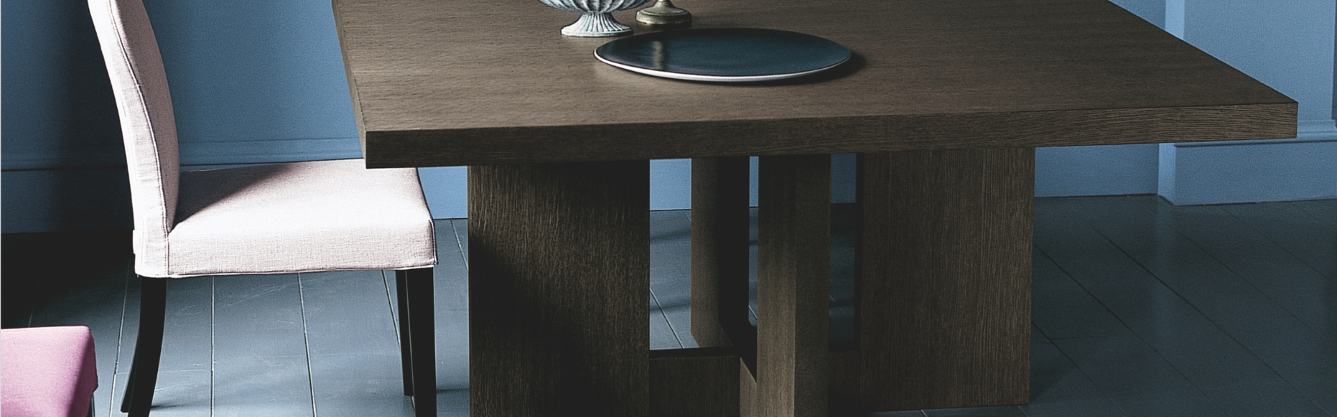 dining table with upholstered chair and decor