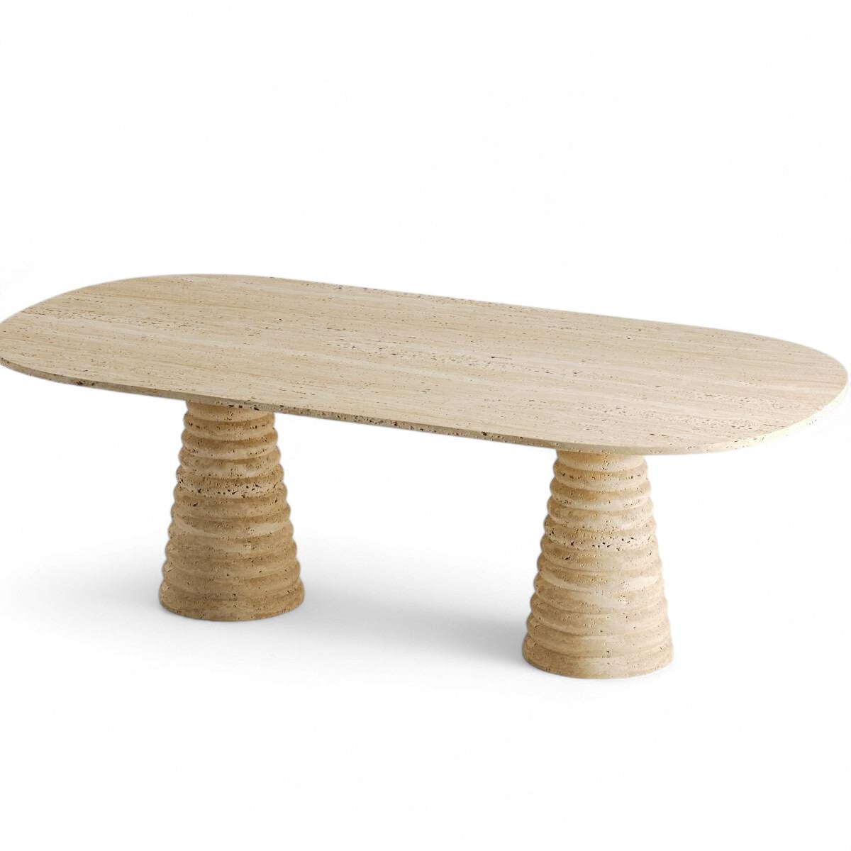 Studio shot of oval travertine dining table with two ribbed bases, natural stone furniture, modern design, interior decor, dining room table, kitchen table, stone table, travertine furniture, oval table, ribbed base table, contemporary furniture, home furnishings, luxury furniture, beige stone table, neutral color table, textured base table, architectural furniture, statement table, living room furniture, office furniture, meeting table
