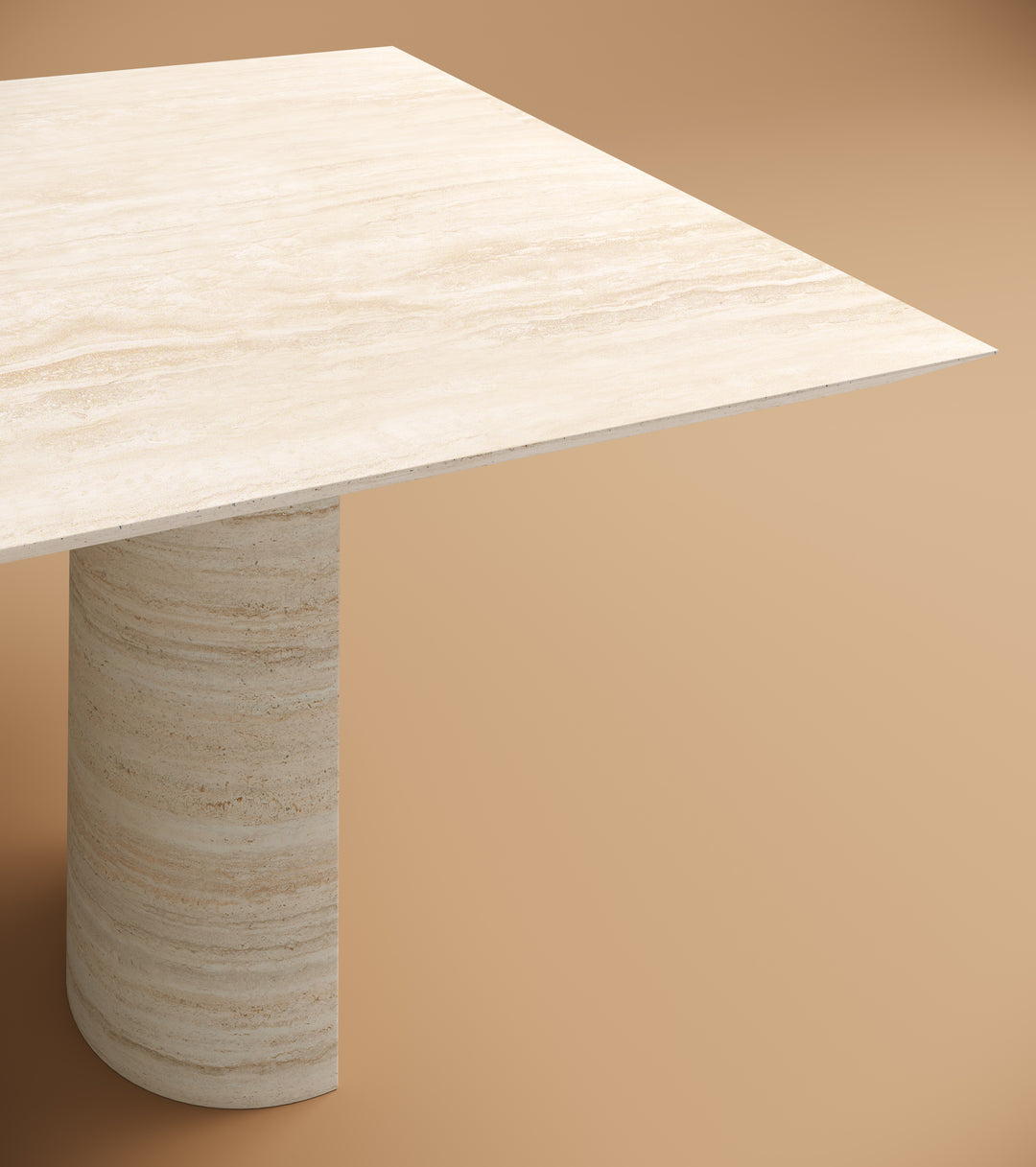 Close-up of Luzione travertine dining table. Natural stone, textured surface, cylindrical base. Modern elegance for dining space