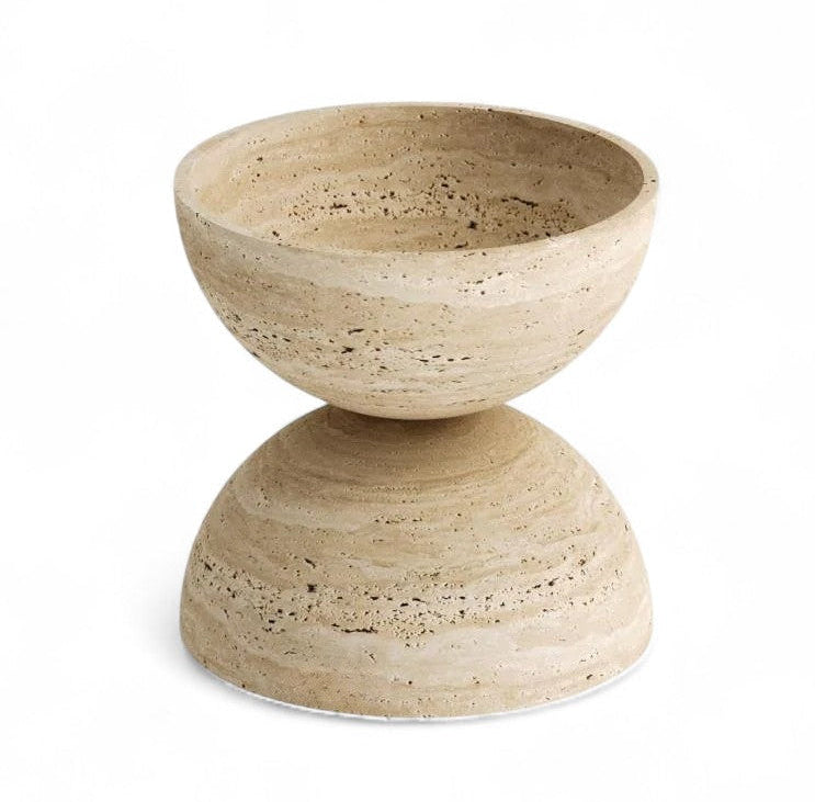 Travertine stone decor bowl hourglass shape on white background