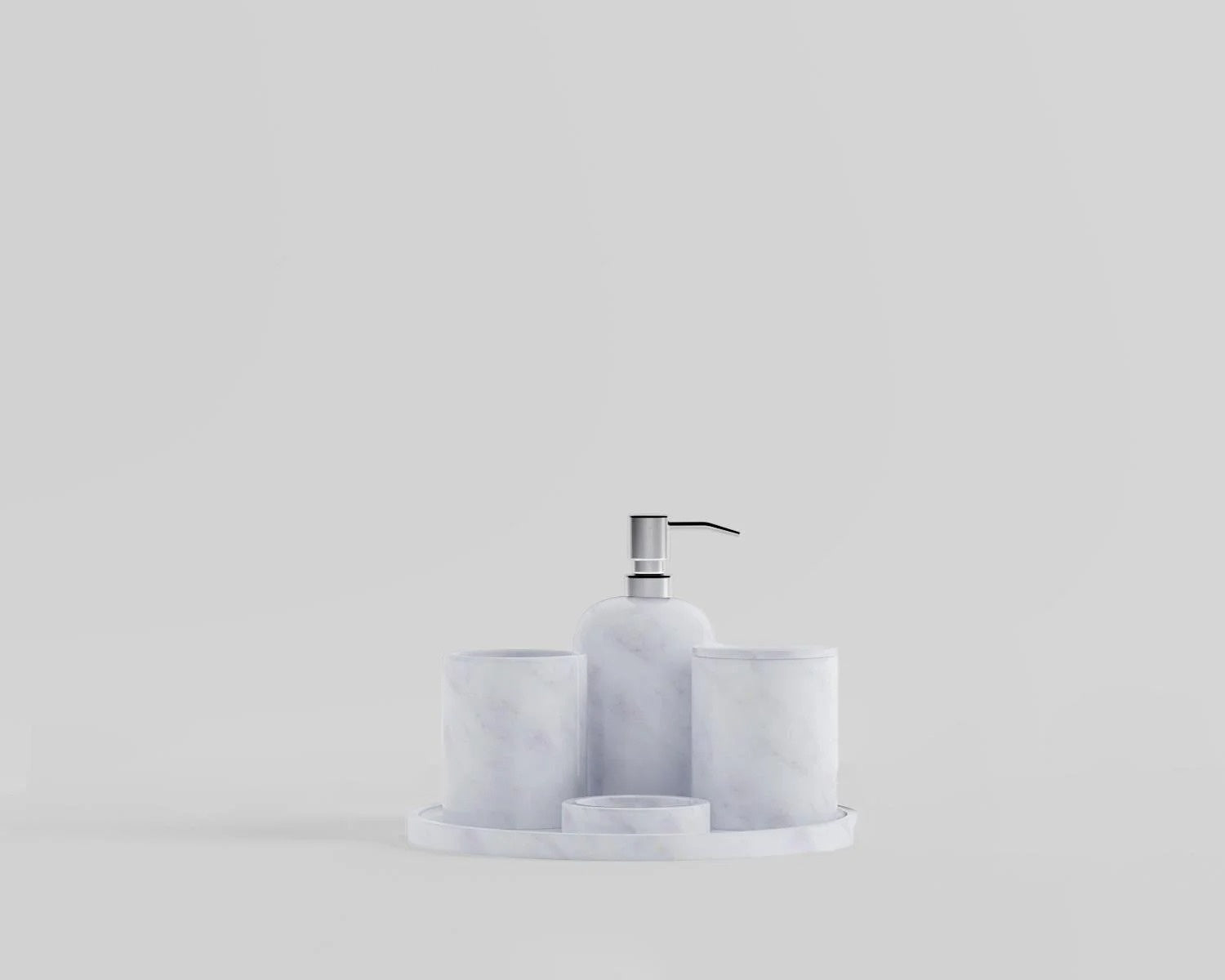 White marble bathroom accessory set with soap dispenser and cups