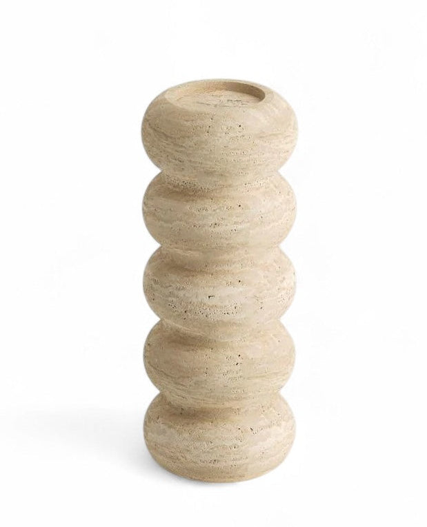 Beige travertine candle holder with stacked spherical shape decor