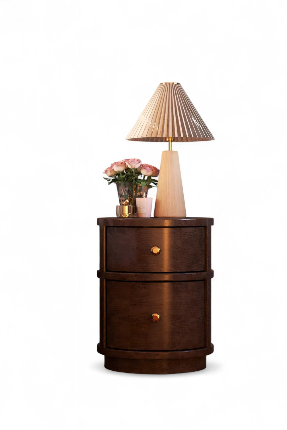 Dark wood nightstand with two drawers and gold hardware, holding a wood lamp and pink roses.
nightstand, dark wood furniture, two drawer nightstand, wood lamp, pleated shade, bedroom furniture, bedside table, gold hardware, home decor, pink roses, accent lighting