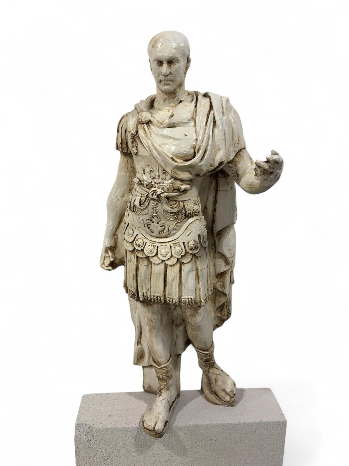 White Roman soldier statue on gray pedestal