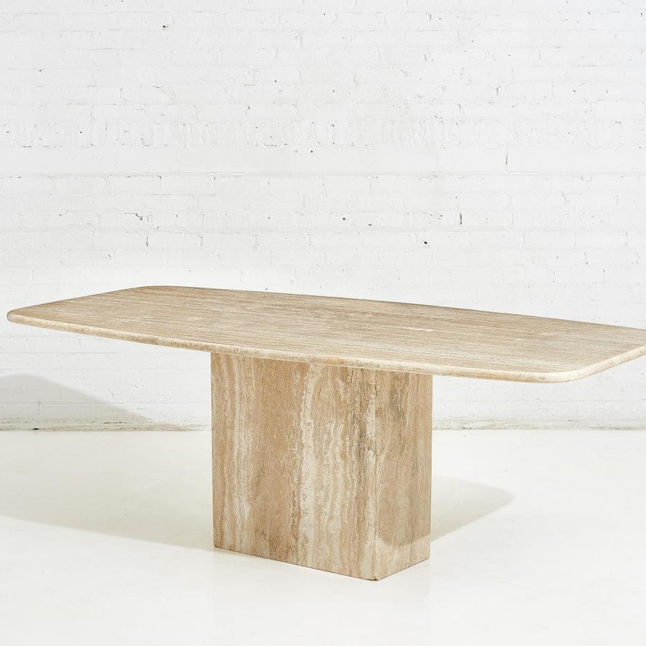 Luzione Aseema travertine dining table with cube legs, showcasing modern design, natural stone, and minimalist aesthetic for dining rooms