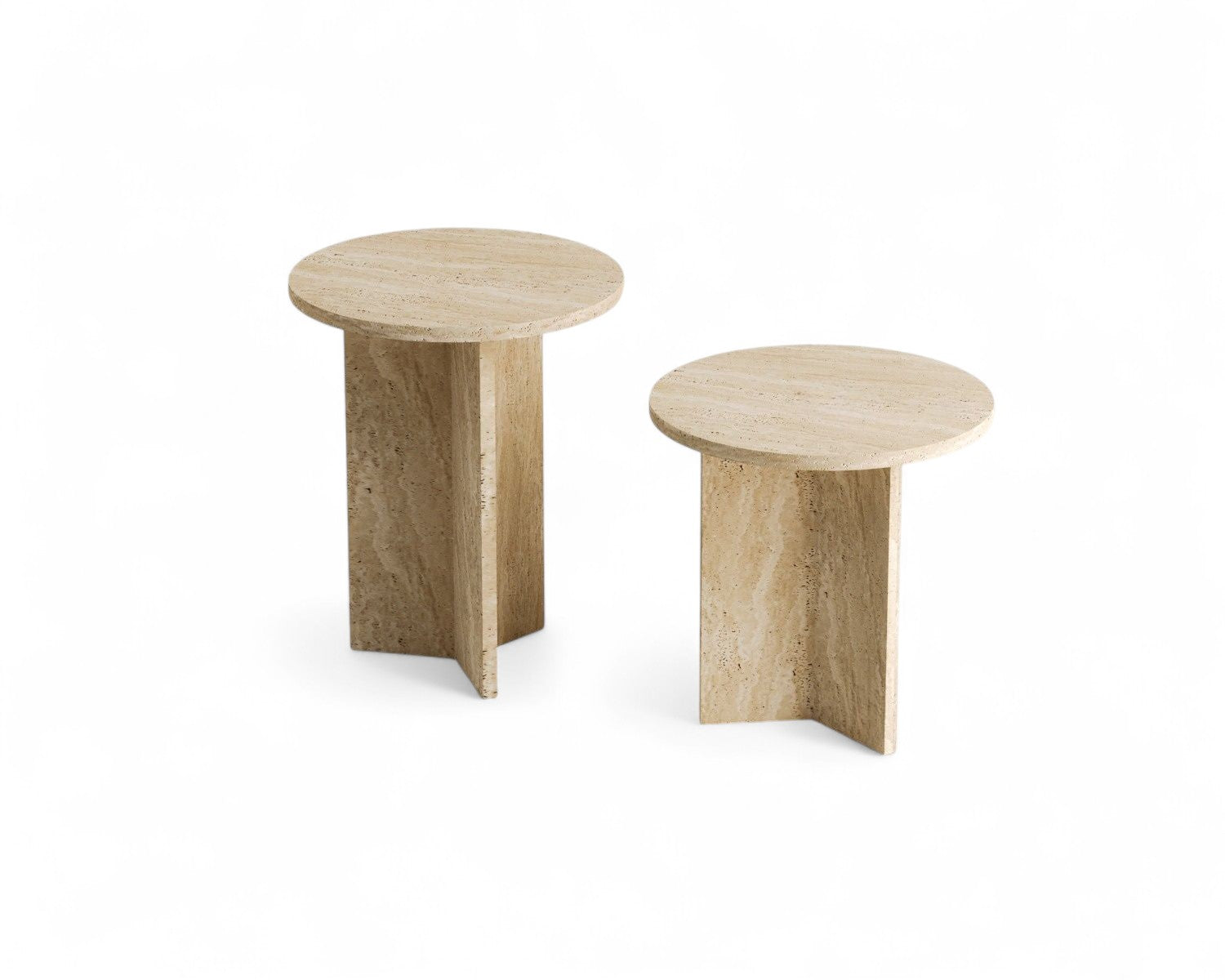 Two round travertine side tables on white background