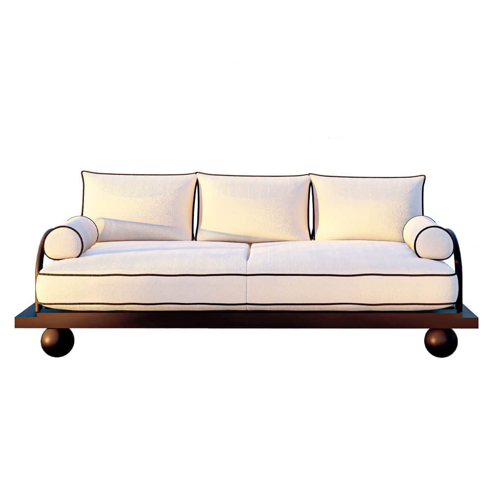 White fabric sofa with dark piping and wood base on sphere feet