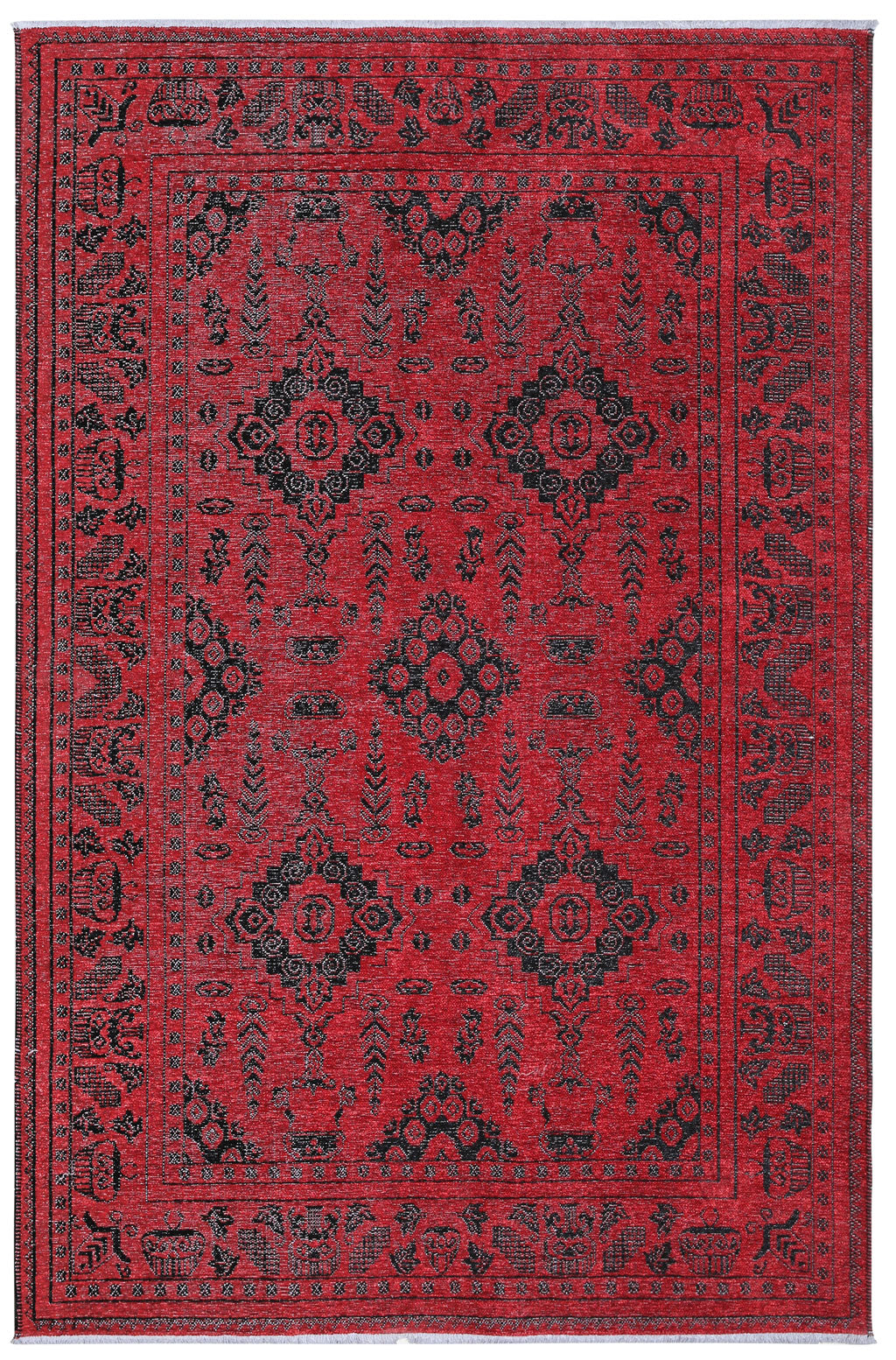 Overhead view of red and black patterned area rug.