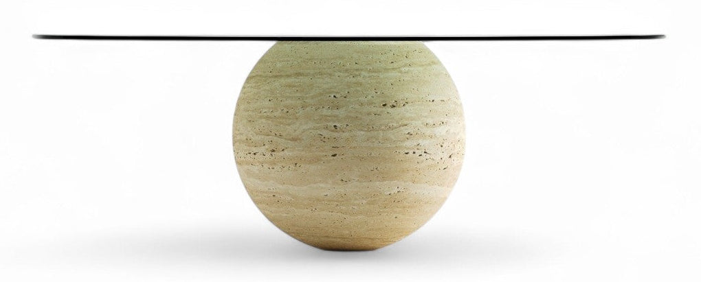 White background studio shot of round glass top travertine coffee table.
