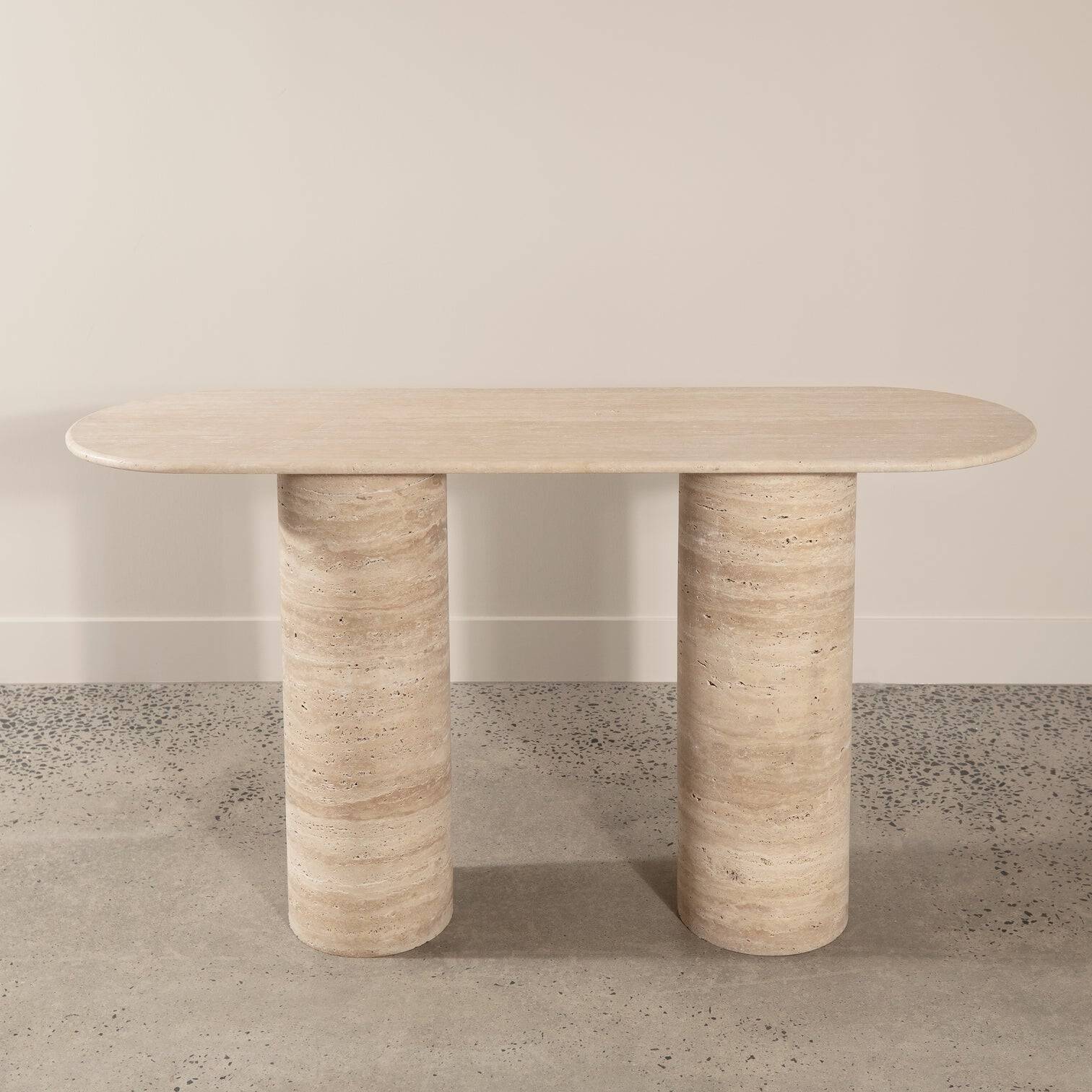 Elegant Luzione Espoir travertine console table with cylindrical legs. A modern, minimalist design perfect for hallways, entryways, or living rooms