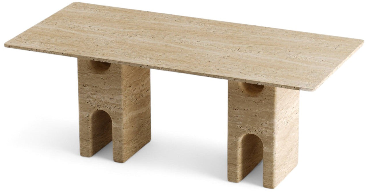 Rectangular travertine table with two arched pedestal bases on white background