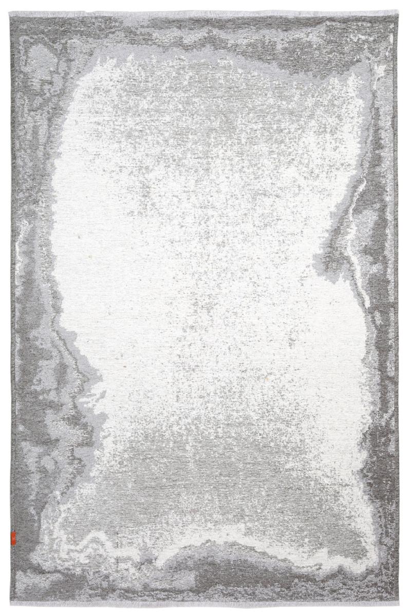 White and gray abstract patterned area rug