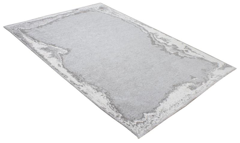 Rectangular gray area rug with distressed border design