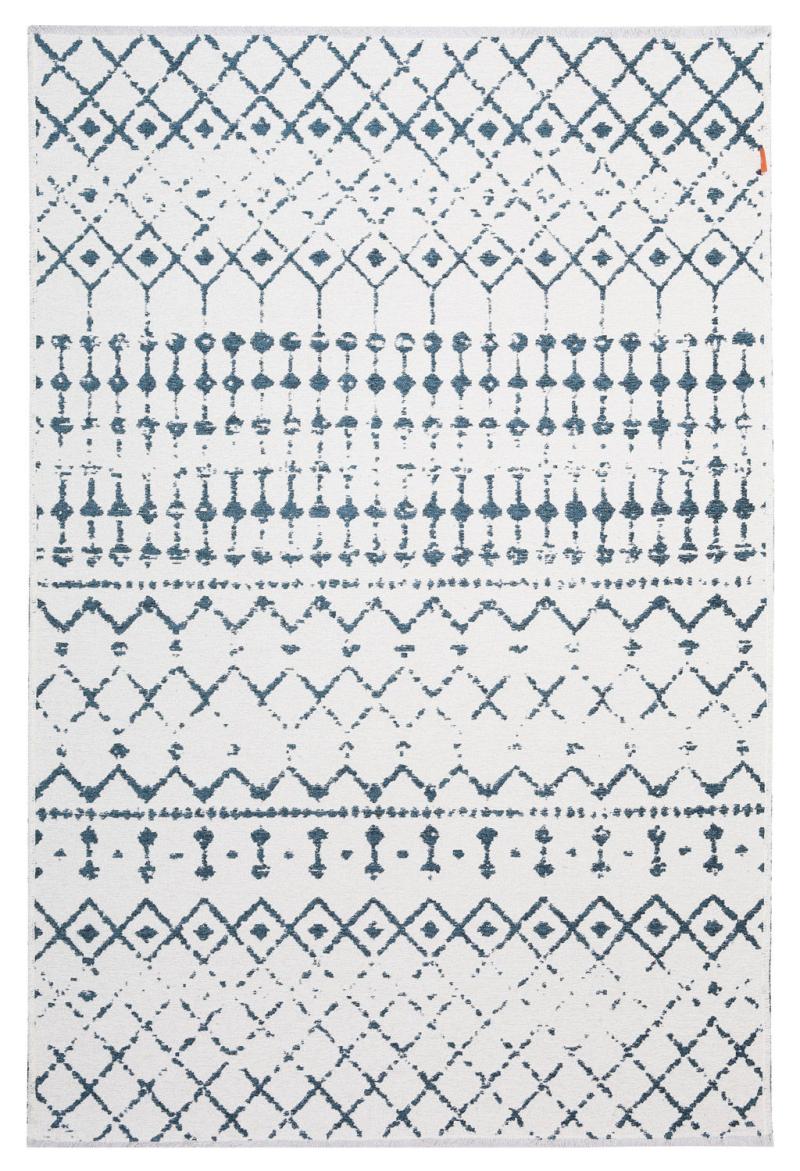 White rug with blue geometric pattern