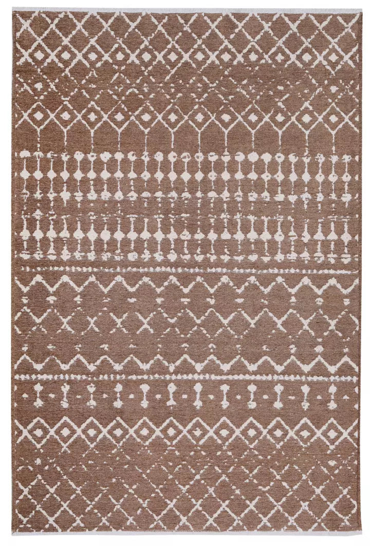 Brown and white patterned area rug featuring geometric designs.