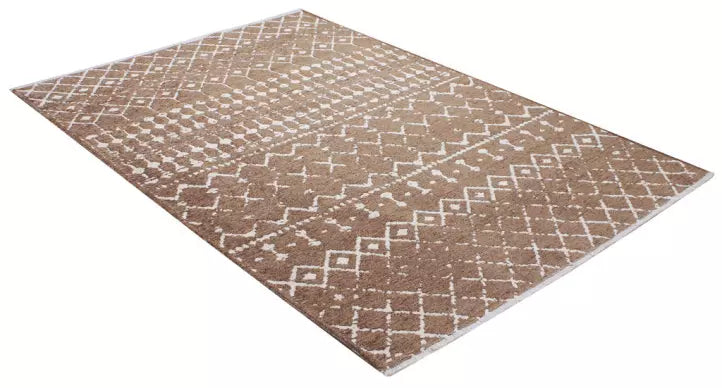 Overhead view of brown and white patterned area rug on white background. Brown area rug with white geometric pattern. Geometric patterned area rug in brown and white colors.