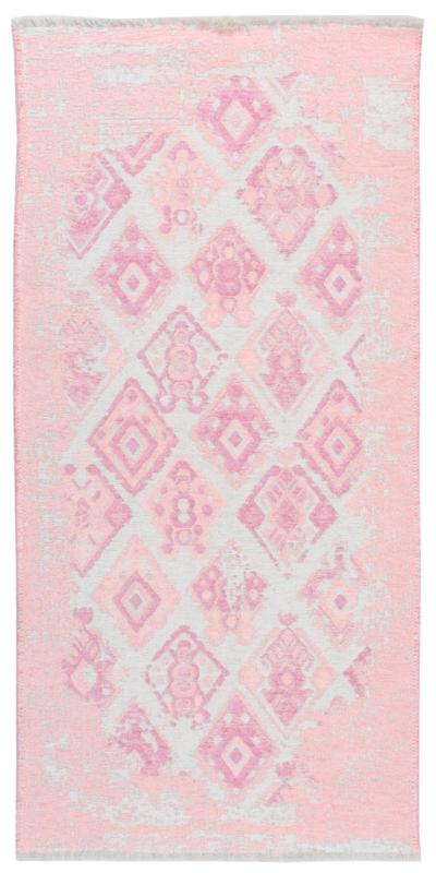 Overhead view pink and white diamond pattern area rug