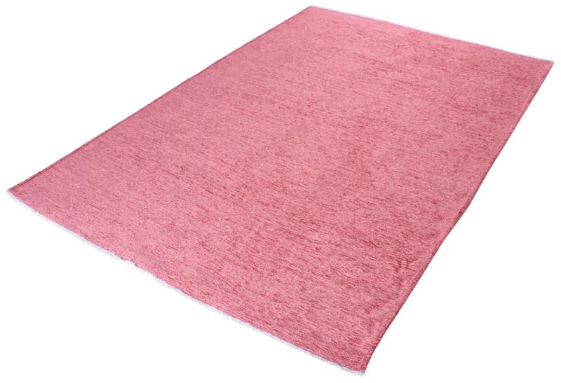 Pink rectangular area rug on white background