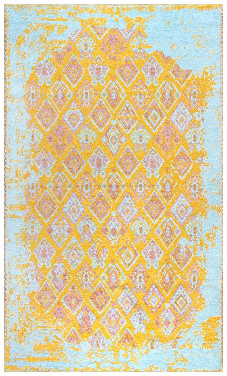 View of yellow and blue distressed patterned area rug