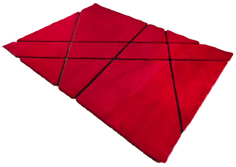 Close-up of Rabbit Fur Rug's vibrant red and black fur, showcasing the richness of its colors.