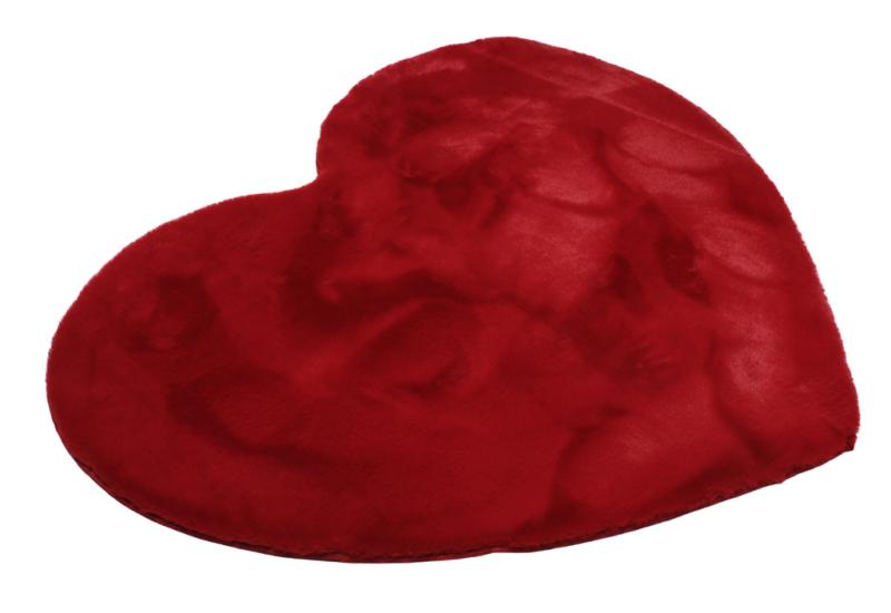 Red plush heart shaped rug on white background