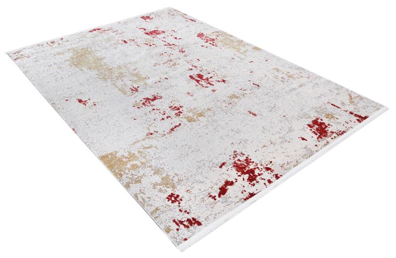 White rug with abstract red and beige pattern on white background.