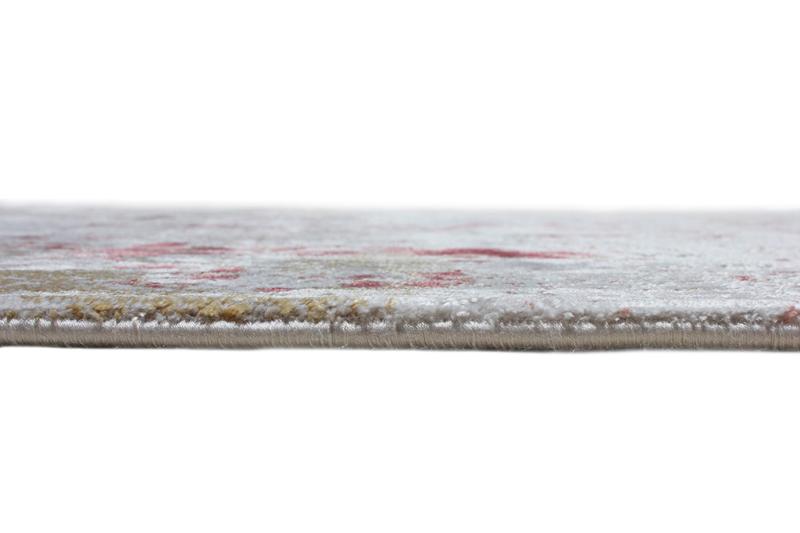 Close up view of rug edge with colorful pattern