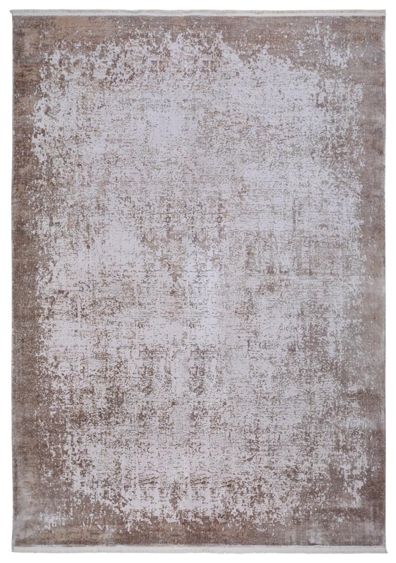 Overhead view of rectangular brown and white distressed area rug