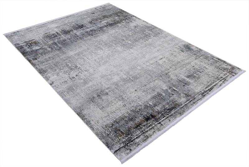 Abstract gray and white area rug on white background