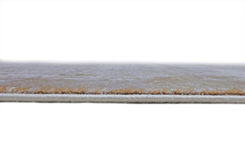 Angled view of Lexus Rug under a coffee table, showcasing its seamless integration into various interior styles.