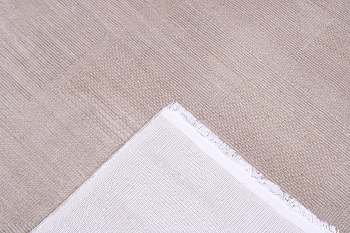 Front view of Infiniti Rug in beige subtle tones, offering versatility for any interior design.