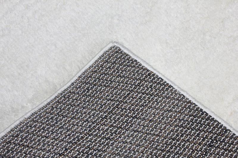 Front view of Tampa Shaggy Rug in soft white texture, offering a cozy and inviting design.