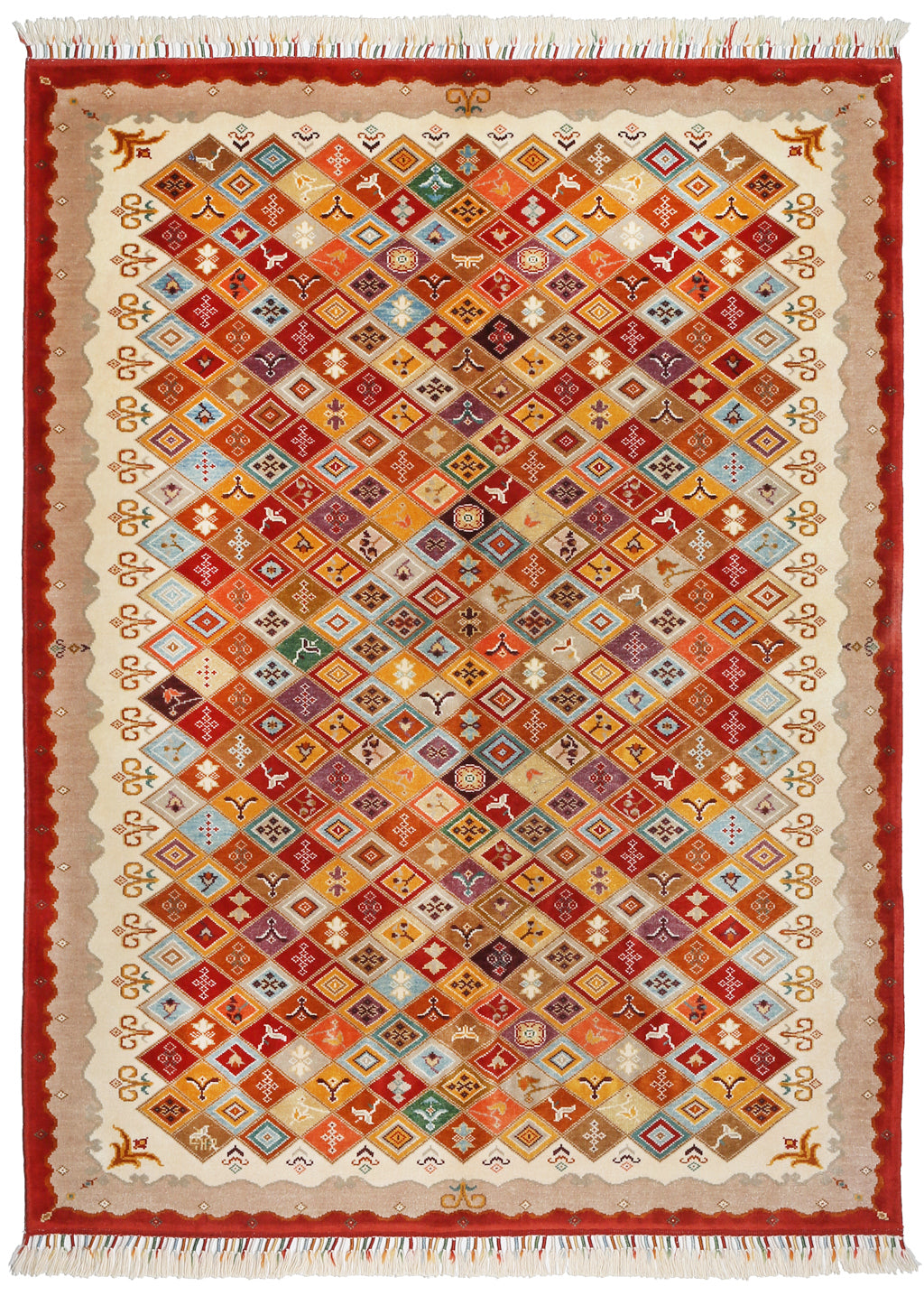 Overhead view colorful diamond patterned area rug with fringe