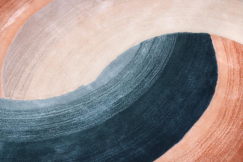 Close-up of the Circle Tufted Rug's intricate tufting, highlighting its plush texture and modern appeal.