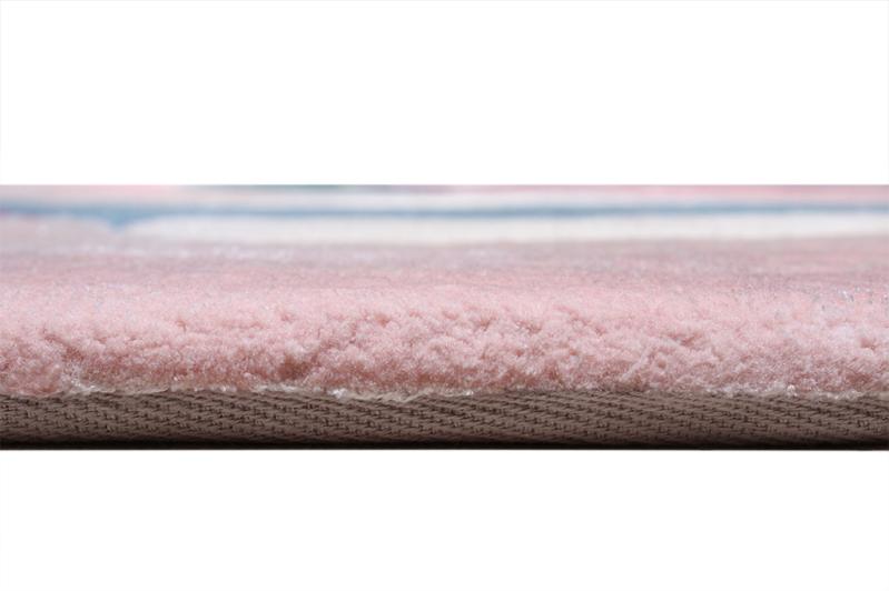 Angled view of Cell Tufted Rug under modern furniture, demonstrating its versatility in various interior settings.