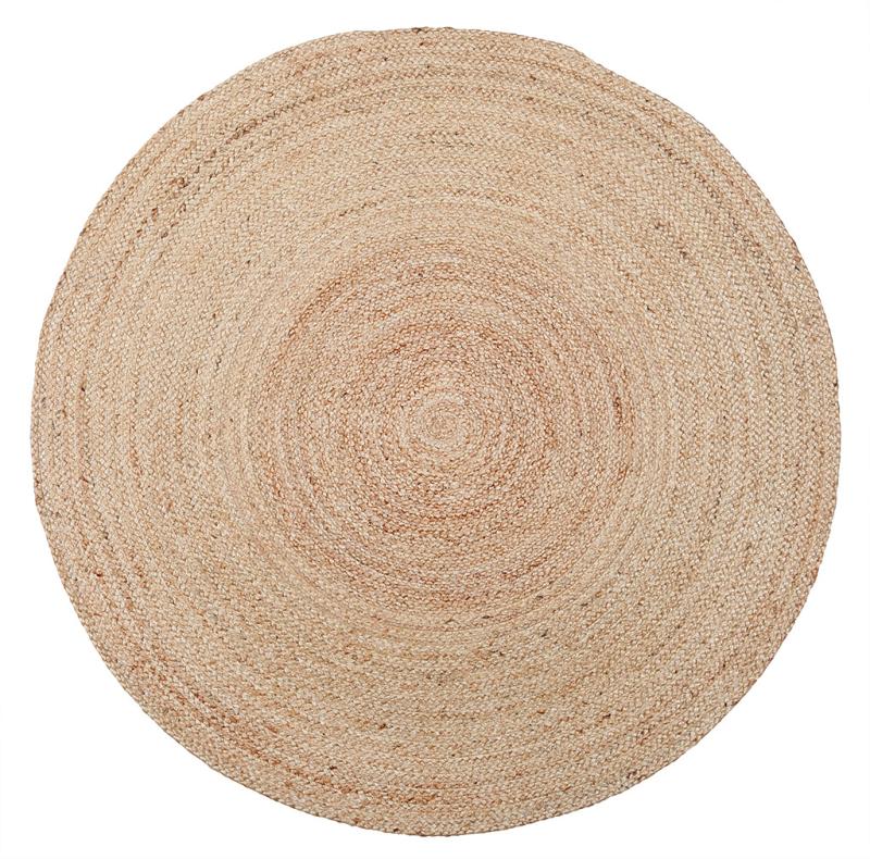 Round braided natural fiber rug on white background