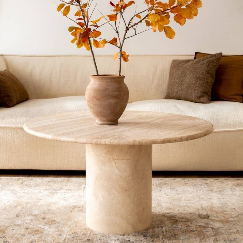 Luzione Cylinder Leg Travertine Coffee Table Round tabletop showcases natural stone veining Minimalist design elevates living room decor