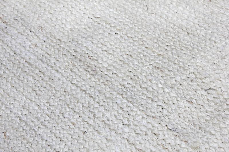 Close up white woven texture rug surface detail