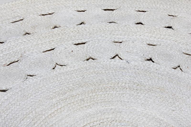 Close up white woven jute rug texture pattern