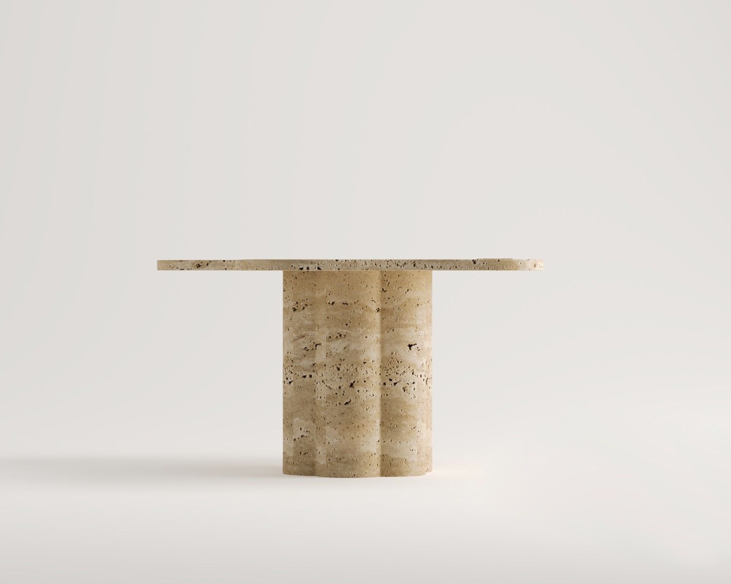 Modern Luzione travertine side table with round top and fluted base. Minimalist design accent table crafted from natural stone for contemporary interiors