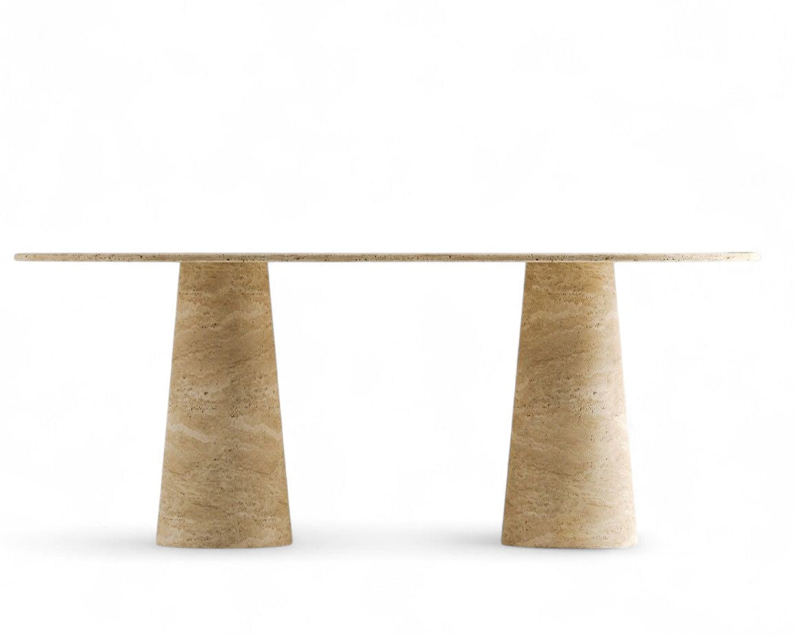 Studio shot of a travertine dining table with two conical bases