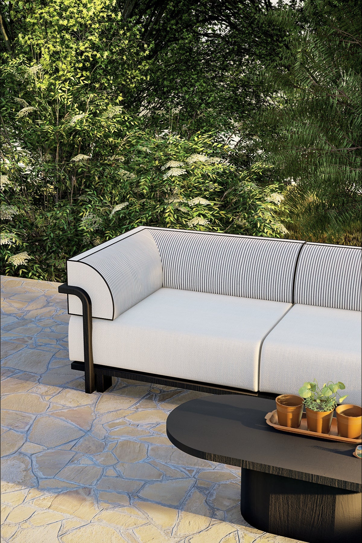Capri outdoor modular seating set featuring white performance cushions and black accents near the poolside.