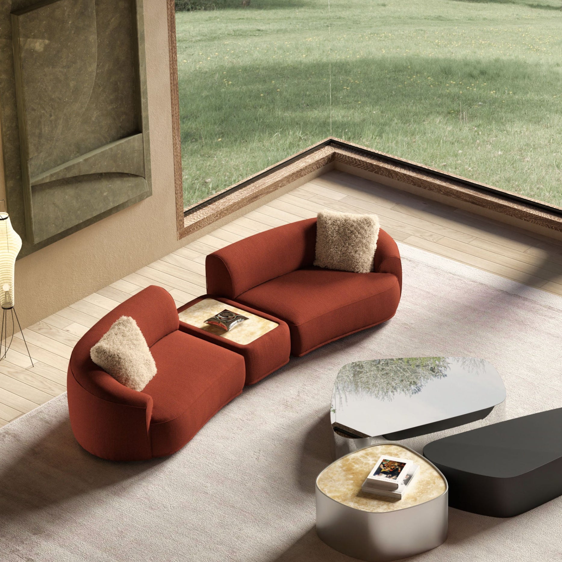 Modern living room with red curved sofa, coffee table, and decorative pillows.